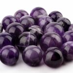 Amethyst Kugel Ø 25 – 26 mm aus Brasilien in sehr schöner Farbe Edelsteine Heilsteine bei Wunderstein24