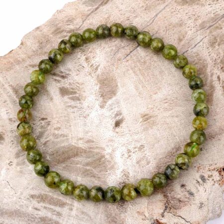 Olivin | Peridot Ø 5,5 mm Kugel | Perlen Armband flexibel und dehnbar Edelsteine Heilsteine bei Wunderstein24