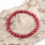 Thulit Ø 6 mm Kugel | Perlen Armband flexibel und dehnbar Edelsteine Heilsteine bei Wunderstein24