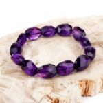 Selected Edition – Amethyst facettiertes Ø 15 x 11 mm Edelstein Armband flexibel Edelsteine Heilsteine bei Wunderstein24