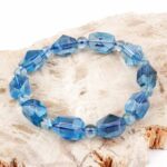 Selected Edition – Aquamarin facettiertes Ø 15 x 11 mm Edelstein Armband flexibel Edelsteine Heilsteine bei Wunderstein24