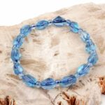 Selected Edition – Aquamarin facettiertes Ø 11 x 7,5 mm Edelstein Armband flexibel Edelsteine Heilsteine bei Wunderstein24