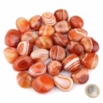 Achat | Streifenachat natur | orange Trommelsteine Ø 30 – 45 mm Edelsteine Heilsteine bei Wunderstein24