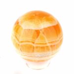 große Orangencalcit Kugel Ø 64 mm aus Mexiko in bester Qualität und Farbe Edelsteine Heilsteine bei Wunderstein24