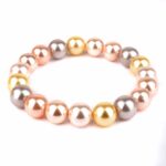 Muschelkern Multicolor Ø 10 mm Kugel Edelstein Armband flexibel und dehnbar Edelsteine Heilsteine bei Wunderstein24