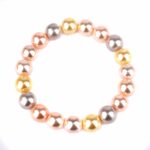 Muschelkern Multicolor Ø 10 mm Kugel Edelstein Armband flexibel und dehnbar Edelsteine Heilsteine bei Wunderstein24